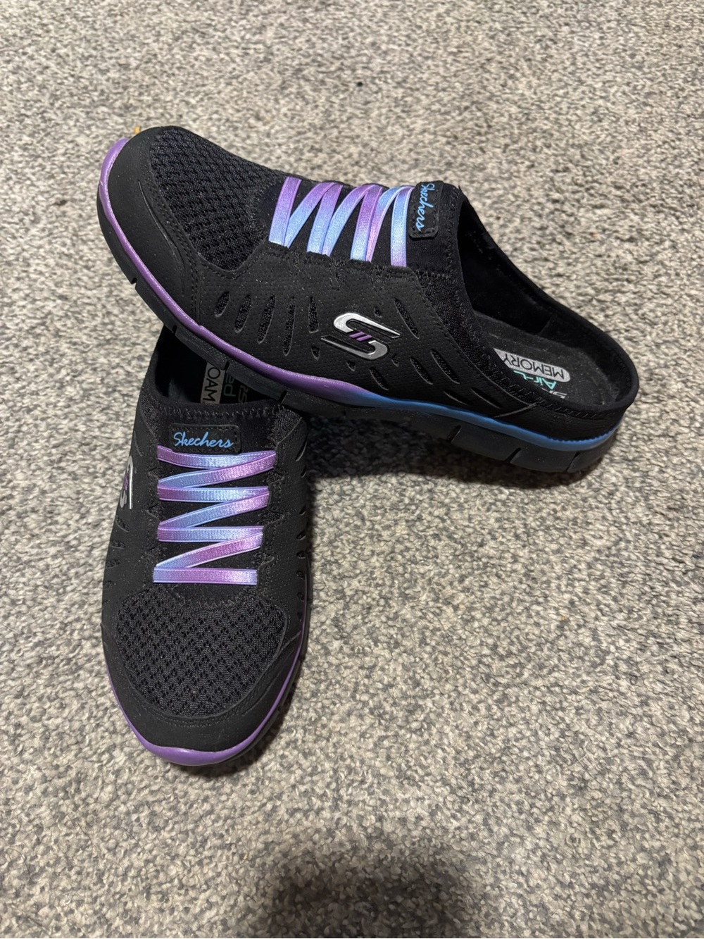 Skechers Black Slip-On Mule with Iridescent Purple-Blue Accents